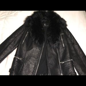 Black leather jacket with attachable fur